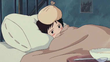 Kiki sick in bed with a cold