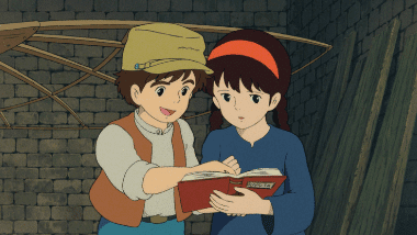 Pazu explaining about the Castle in the Sky his father photographed.