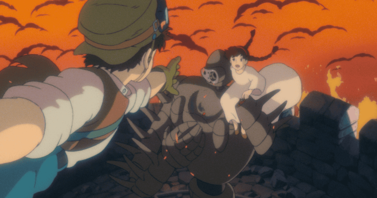 Boy reaching toward a girl carried by a giant robot amid flames, smoke, and destruction