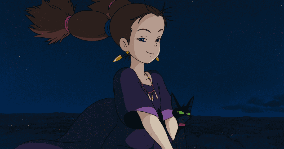Young woman holding a black cat under a starry night sky