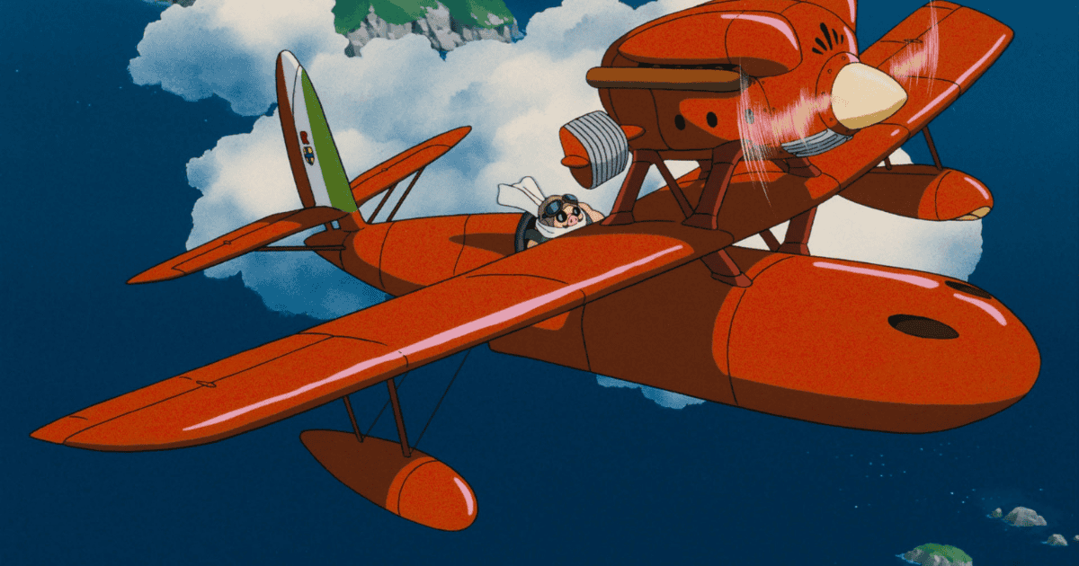 Red seaplane flying above the sea with a pig-faced pilot in the cockpit and clouds in the background
