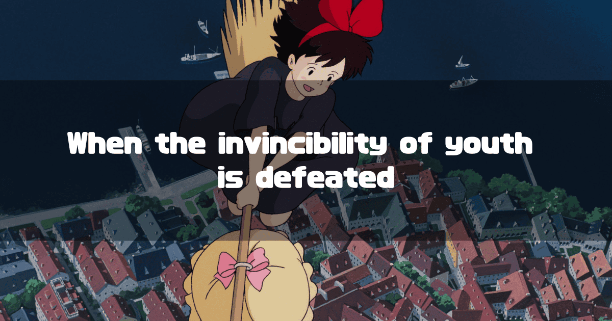 A low-angle view shows Kiki from Kiki's Delivery Service flying on her broom high above a European-style town at night. Below her, another person flies on a mop with a pink bow. White text overlaid on the dark blue sky reads: "When the invincibility of youth is defeated"