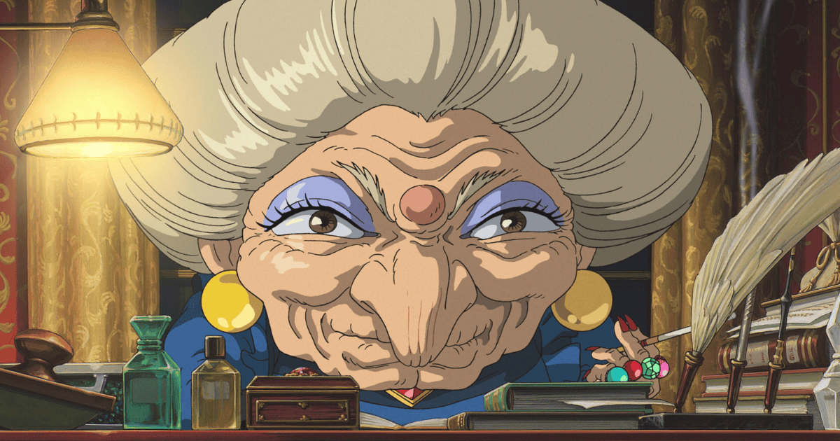 Yubaba sitting at her desk in her ornate bathhouse office in Spirited Away