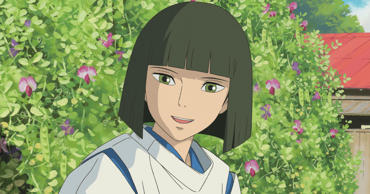Haku smiling in front of lush green vines and purple flowers in Spirited Away