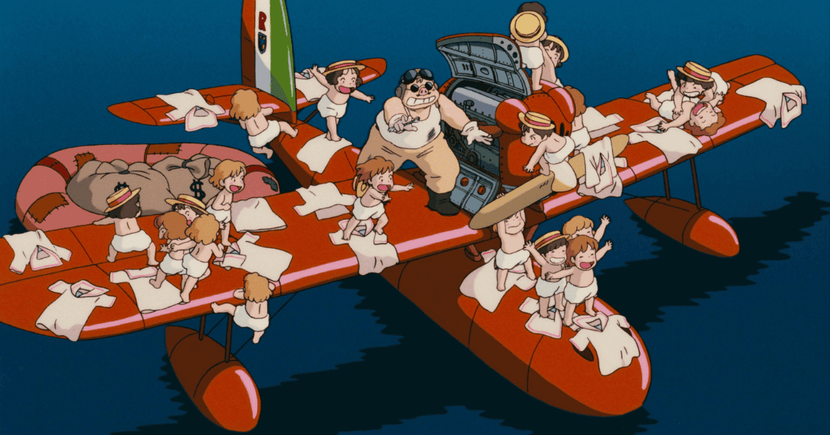 Porco Rosso standing on his red seaplane as a group of young girls climb across the wings over the sea
