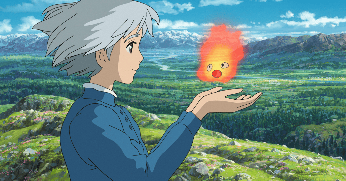 Howl holding Calcifer above his hand while overlooking a vast green valley and distant mountains