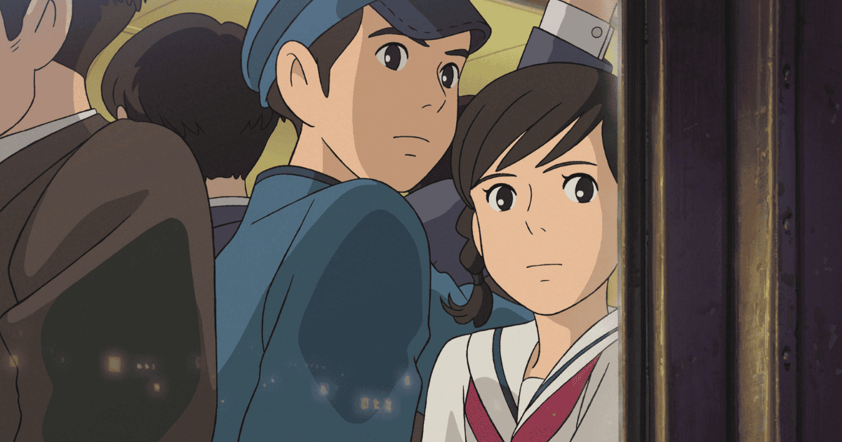Shun Kazama and Umi Matsuzaki standing together on a crowded train in From Up on Poppy Hill