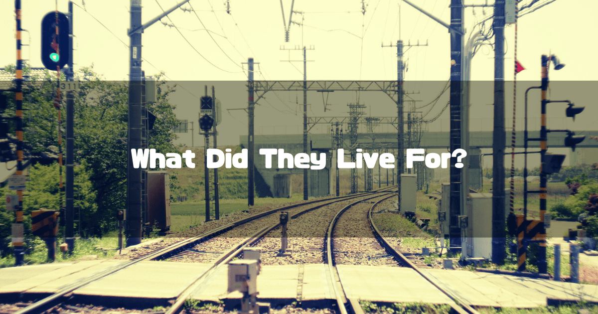A Heading With A Railroad Crossing And Tracks In The Background, Overlaid With The Catchphrase, “What Did They Live For?”